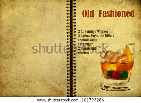 Old,vintage or grunge Spiral Recipe  Notebook with Old Fashioned  cocktail  on the page.Room for text