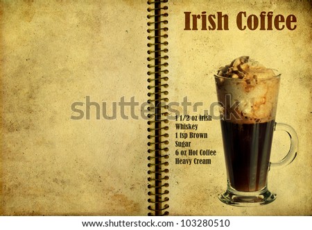 Old,vintage or grunge Spiral Recipe Notebook with Irish Coffee  cocktail on the page.Room for text
