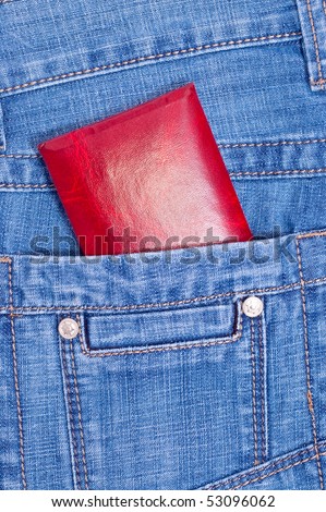 Red documents in back jeans pocket. Isolated on white