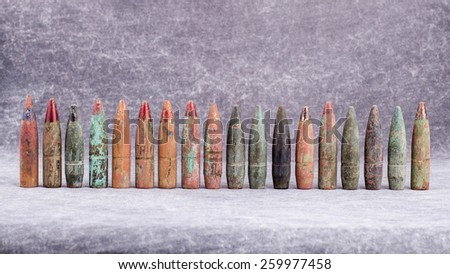 Objects of war, old and rusty bullets.