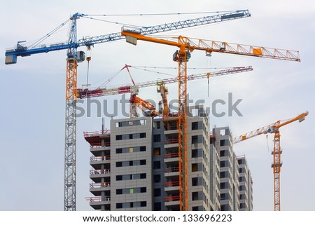 Building cranes and building house.israel.tel aviv