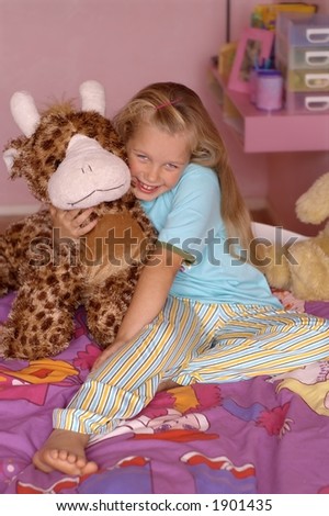 Smiling girl in pyjamas