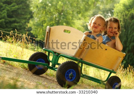 Little sisters having fun - stock photo
