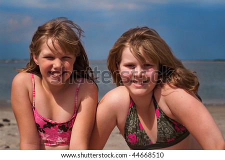 stock photo Two teens on the beach