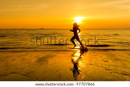 silhouette of female runner during sunset