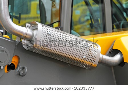Aluminum metal exhaust pipe on modern machine