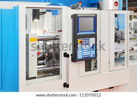 Automated metal lathe machine system in factory