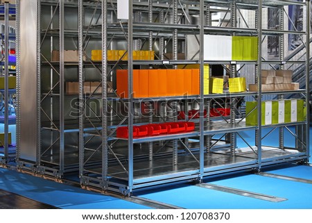Mobile metal shelves storage system in warehouse