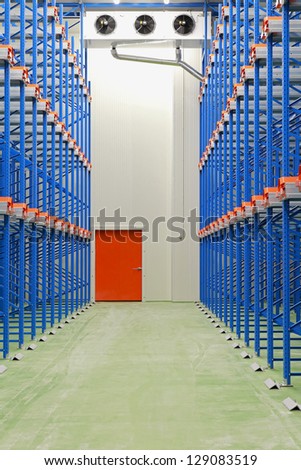 Refrigerated and freezing warehouse with blue shelves