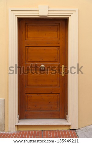 Classic style brown wood door house entrance