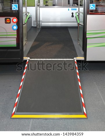 Door and ramp for wheelchair at city bus