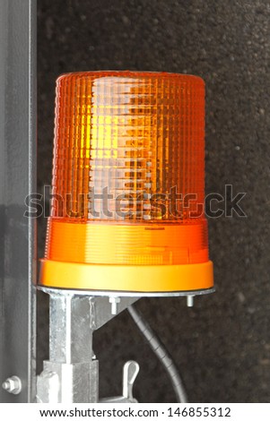 Amber warning flashing light beacon at trailer