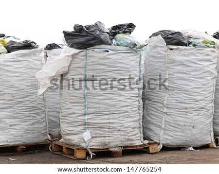 Big industrial bulk bags with recycling material at pallets