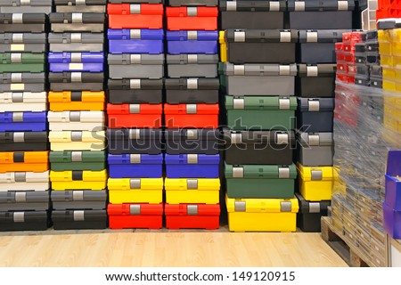 Big bunch of colorful plastic tool boxes