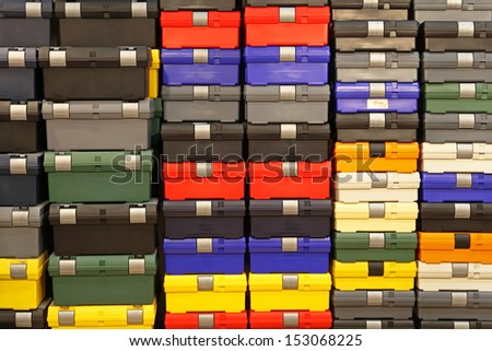 Big bunch of colorful plastic tool boxes