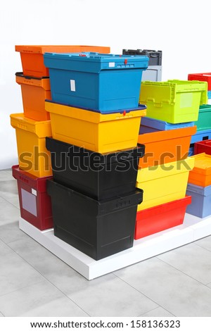 Colourful plastic crates and boxes for delivery shipping