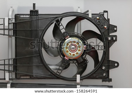 Electric car cooling fan with plastic blades