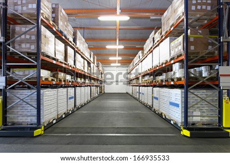 Big storage room for goods in factory