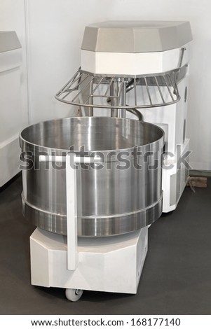 Dough mixer with big bucket in bakery