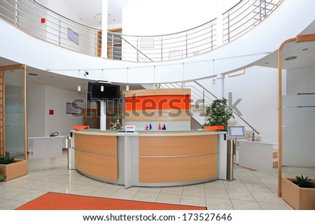 Modern company entrance with front desk reception