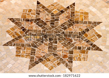 Marble floor mosaic with octagonal star shape