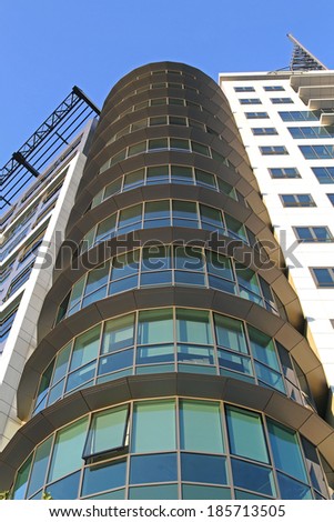 Modern building exterior with oval glass room
