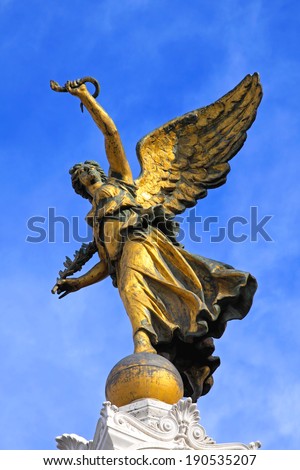 ROME, ITALY - OCTOBER 25: Winged Victory statue in Rome on OCTOBER 25, 2009. Victorian Winged Victory holding palm and snake sculpture in Rome, Italy