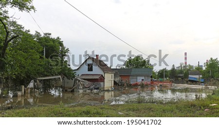 OBRENOVAC, SERBIA - MAY 24: Flood in Obrenovac on MAY 24, 2013. Flooded and ruined houses near power plant in Obrenovac, Serbia.