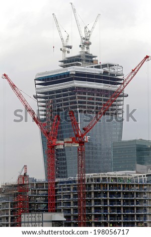 LONDON, UNITED KINGDOM - JANUARY 25: Skyscraper construction site in London on JANUARY 25, 2013. 20 Fenchurch Street building site at City in London, United Kingdom.