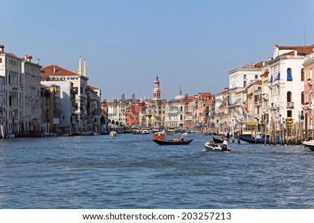 VENICE, ITALY - JULY 8: Grand Canal in Venice on JULY 8, 2013. Famous Grand Canal near Rialto Bridge in Venice, Italy.