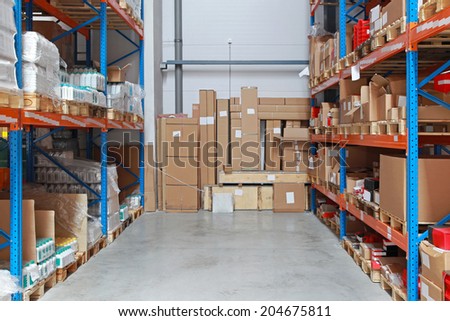 Cardboard boxes with merchandise in distribution center