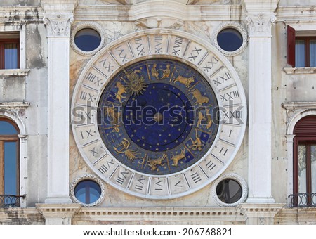VENICE, ITALY - JULY 08: St Mark clock in Venice on JULY 08, 2013. Zodiac dial at clock tower in Venice, Italy.