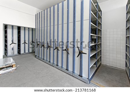 Automated shelving system with mobile cabinet for documents