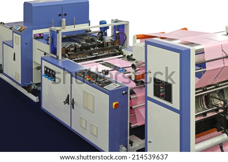 Machine for plastic bags production from roll