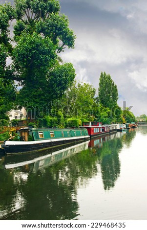 Big canal way with long narrow boats