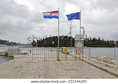 ROVINJ, CROATIA - OCTOBER 15: Border Crossing in Rovinj on OCTOBER 15, 2014. Port dock with border line in Rovinj, Croatia.