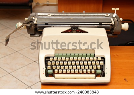 Retro style typewriter at office desk