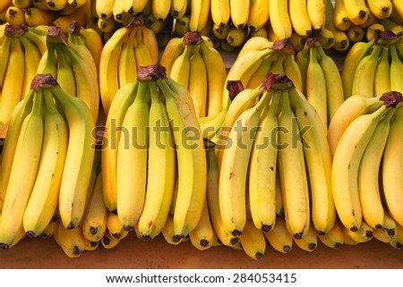 Bunch of ripened bananas at grocery store