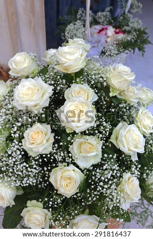 White Roses Wedding Bouquet in Front of the Church