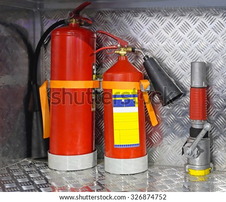 Two Fire Extinguishers and Emergency Equipment
