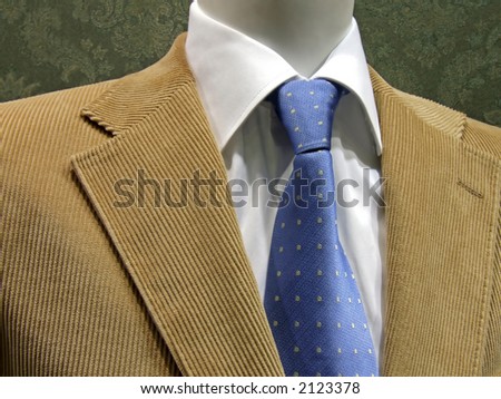 Blue tie with shirt and velvet suit
