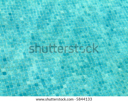 Very clean and clear light blue swimming pool