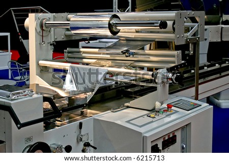 Automated packaging machine for aluminum foil packs