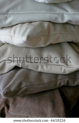 Grey decorative pillows made from real leather
