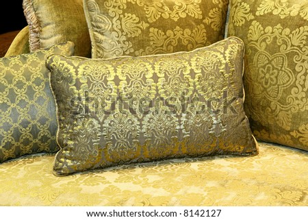 Green decorative pillows made from decorative textile