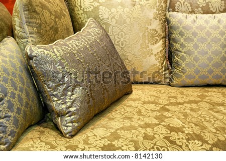 Green decorative pillows made from decorative textile