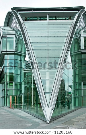 Triangle geometric business building all in glass