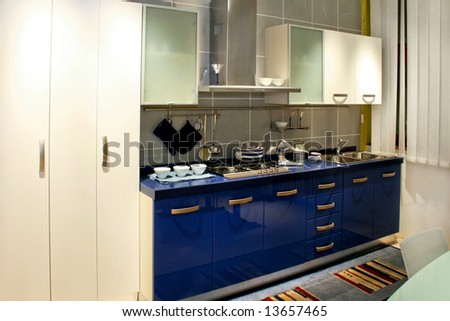 Contemporary blue kitchen counter with all utensils