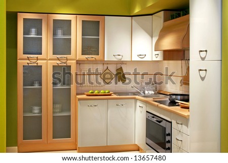 Modern wooden kitchen counter with big cabinet