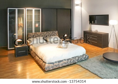 Modern double bed and big wardrobe closet